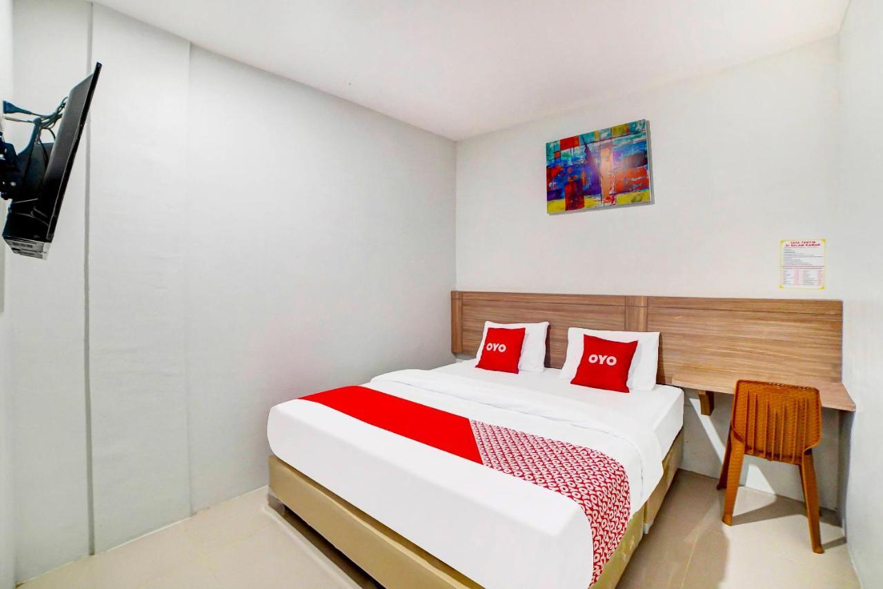 Oyo 91211 Mega Comfort Guest House Medan Luaran gambar